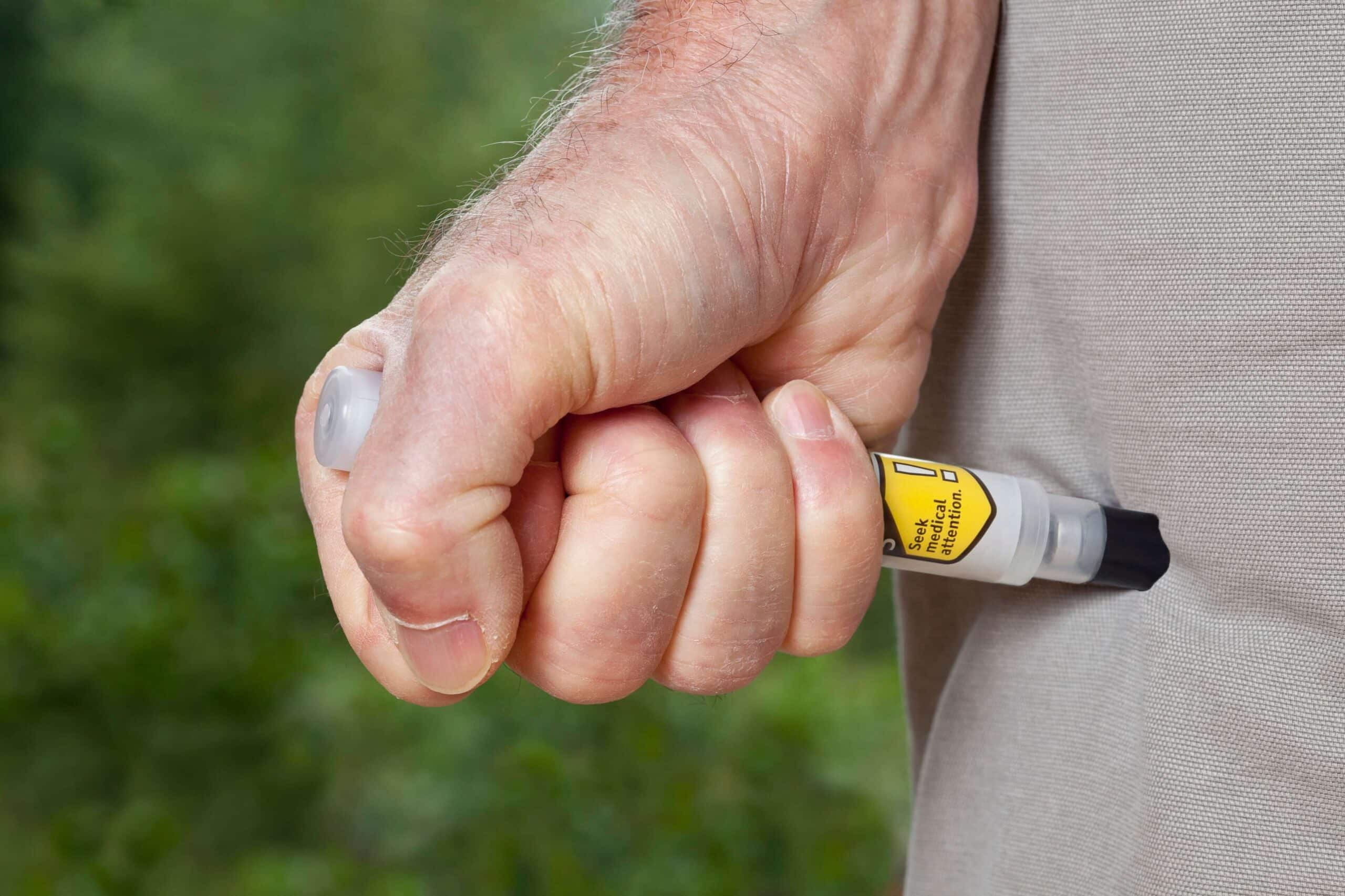 iStock-Man-EpiPen-injection-TP